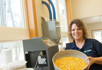 photo of Paige Harpenau, office manager at grain scale